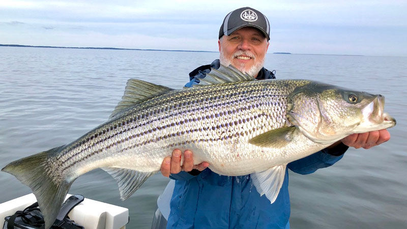 captain larry with a big rockfish