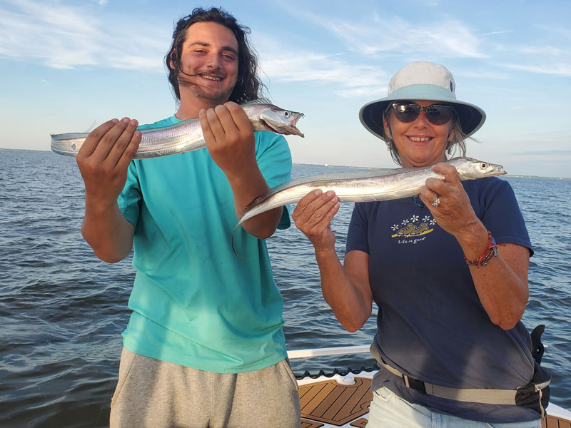 anglers with ribbonfish caught in the chesapeake bay