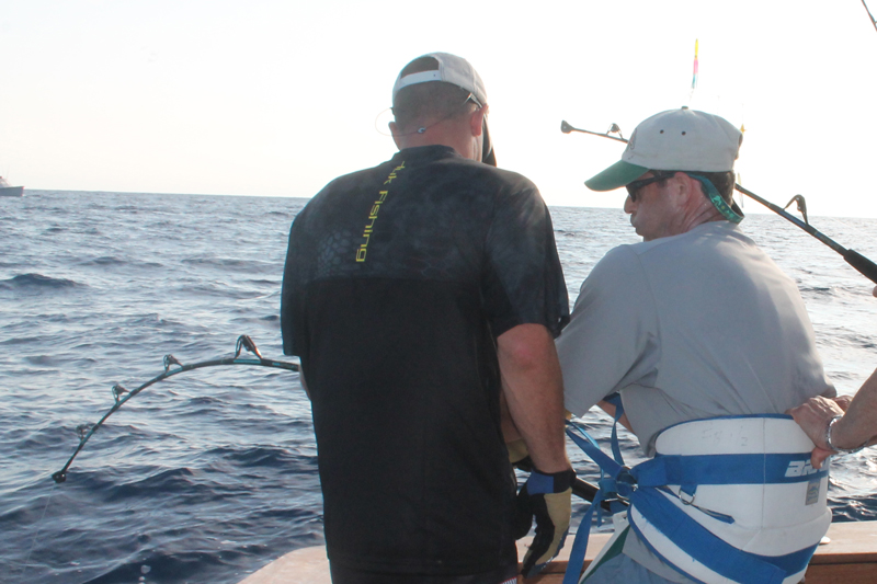 angler fighting a huge fish