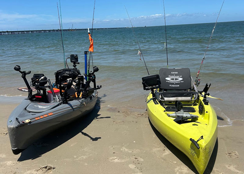 fishing kayaks on the beach