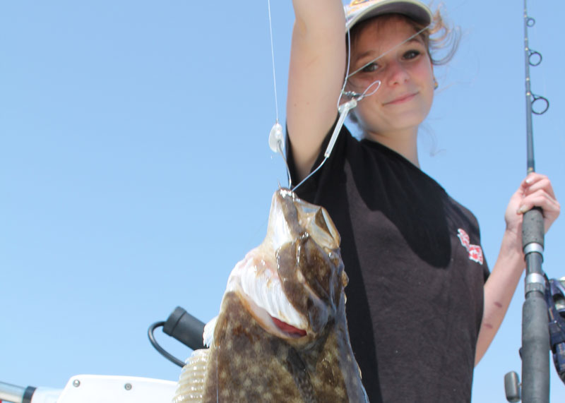 girl caught a flounder