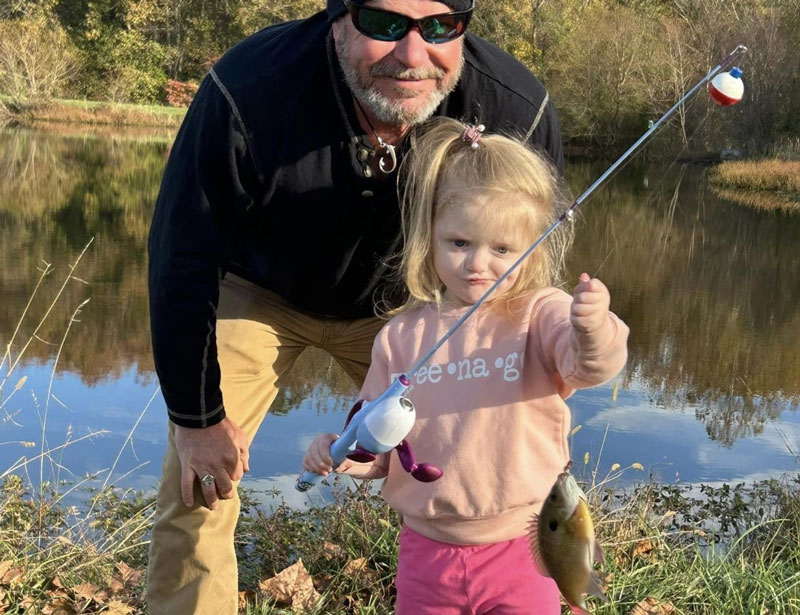 kid catches a bluegill