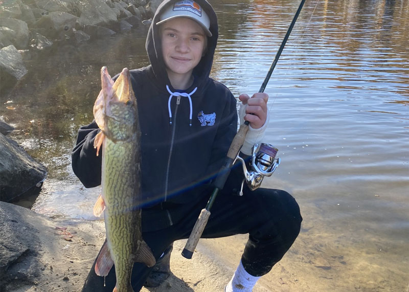 angler catching large pickerel