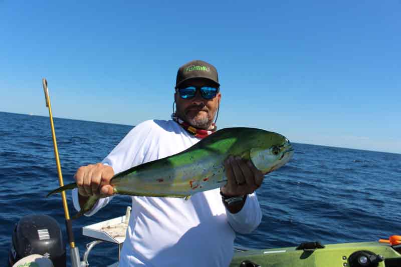 angler with mahi mahi