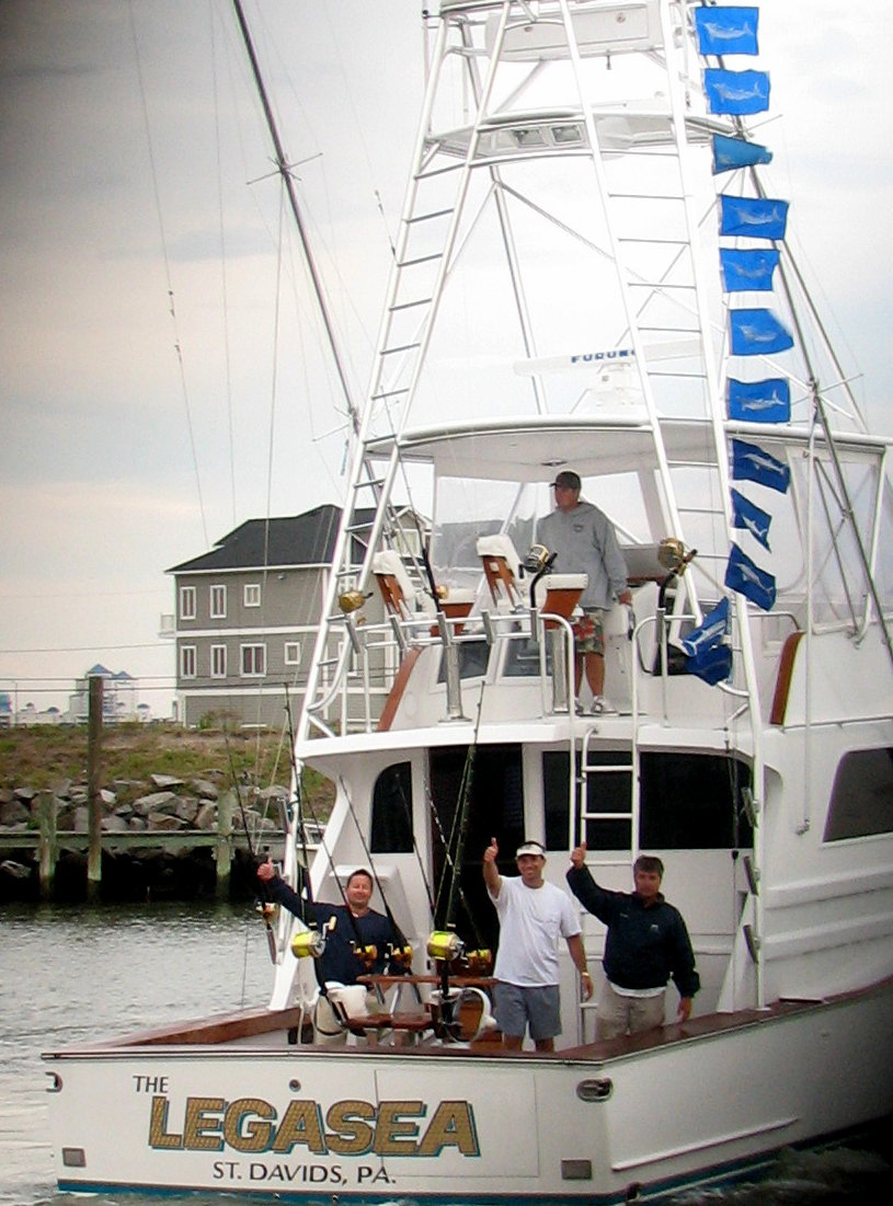 ocean sportfishing boat flying marlin flags