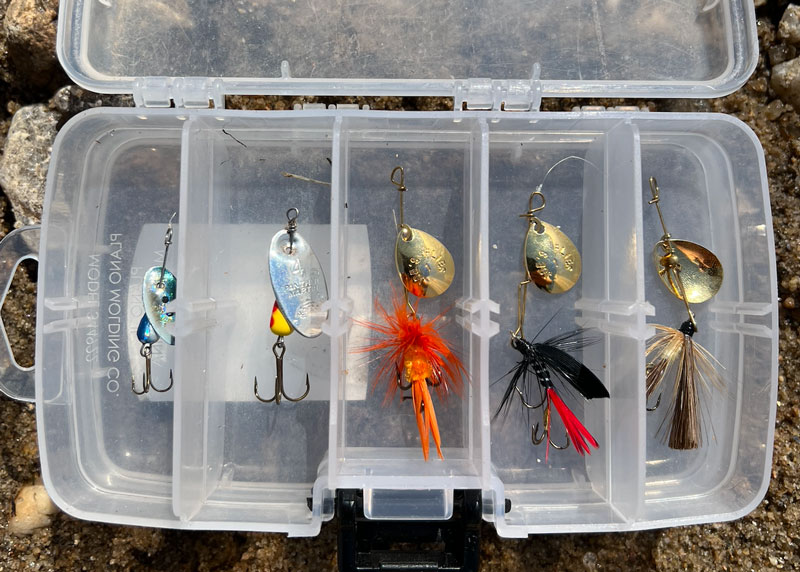 spinners for trout fishing in a river