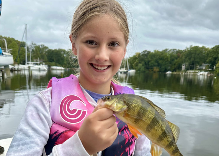 yellow perch angler with her catch